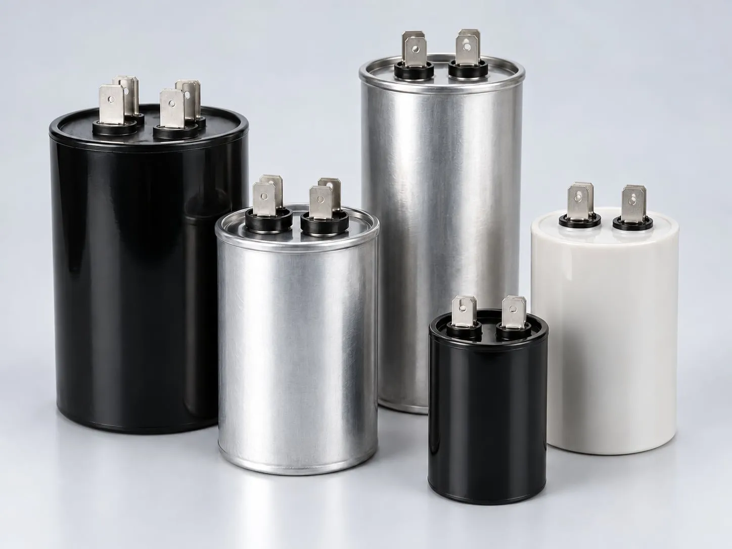 Group of cylindrical industrial start capacitors